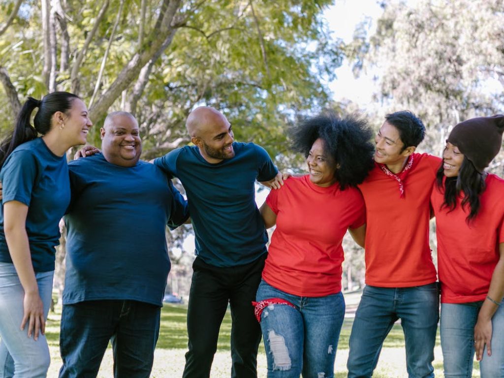 Group of people wearing blue and red shirts
