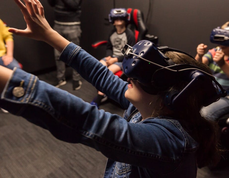 Kids in VR escape room at Entermission - KKDay Title: Top 10 Family Attractions in Melbourne